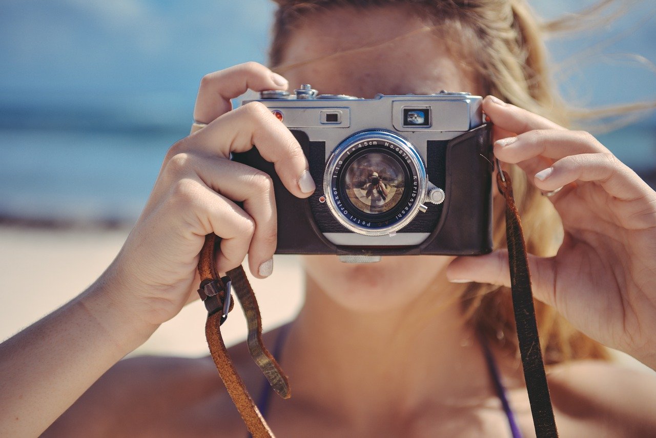 Appareil photo hybride ou reflex
